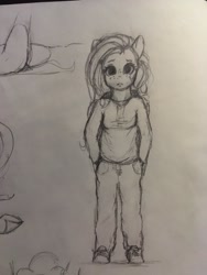 Size: 1536x2048 | Tagged: safe, artist:miokomata, character:fluttershy, species:anthro, species:pegasus, g4, clothing, eyebrows, female, freckles, freckleshy, frown, grayscale, hand in pocket, hoodie, looking at you, mare, monochrome, pencil drawing, traditional art