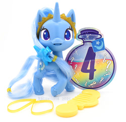 Size: 635x615 | Tagged: safe, photographer:conphettey, character:trixie, species:pony, species:unicorn, g4.5, comb, female, headband, irl, photo, reveal the magic, simple background, solo, toy, white background