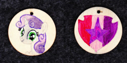 Size: 1024x513 | Tagged: safe, artist:malte279, character:sweetie belle, species:pony, species:unicorn, g4, craft, cutie mark, female, filly, jewelry, necklace, pendant, the cmc's cutie marks, traditional art, wood, young