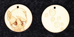Size: 1024x513 | Tagged: safe, artist:malte279, character:derpy hooves, species:pegasus, species:pony, g4, craft, cutie mark, female, jewelry, necklace, pendant, pyrography, traditional art, wood