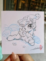 Size: 1536x2048 | Tagged: safe, artist:paipaishuaige, character:cozy glow, species:pegasus, species:pony, g4, bow, cozybetes, cute, female, filly, looking at you, lying down, photo, prone, signature, sketch, smiling, solo, three quarter view, traditional art, young
