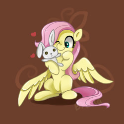 Size: 1280x1280 | Tagged: safe, artist:brella, character:fluttershy, species:pegasus, species:pony, g4, abstract background, cute, doll, female, filly, filly fluttershy, floating heart, heart, mare, one eye closed, plushie, shyabetes, signature, simple background, sitting, solo, spread wings, toy, wings, young, younger