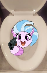 Size: 1181x1823 | Tagged: safe, alternate version, artist:cadillacdynamite, character:silverstream, species:pony, species:seapony (g4), g4, cute, delet this, diastreamies, female, gun, handgun, irl, looking at you, open mouth, photo, pistol, ponies in real life, smiling, solo, toilet, weapon