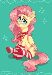 Size: 1427x2048 | Tagged: safe, artist:skysorbett, character:fluttershy, species:pegasus, species:pony, g4, bell, bow tie, clothing, colored eyebrows, cute, eyebrows, female, green background, heart eyes, looking at you, mare, shyabetes, signature, simple background, sitting, socks, solo, striped socks, three quarter view, wingding eyes