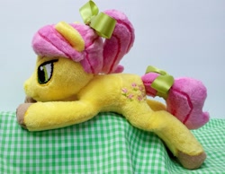Size: 1200x931 | Tagged: safe, artist:basil_leafeon, character:posey, character:posey bloom, g1, g5, bow, cute, floppy plush, g1betes, hair bow, laying down, photo, plush, poseybetes