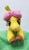 Size: 707x1200 | Tagged: safe, artist:basil_leafeon, character:posey bloom, species:earth pony, species:pony, g5, adoraposey, bow, cute, floppy plush, hair bow, lying down, photo, plush