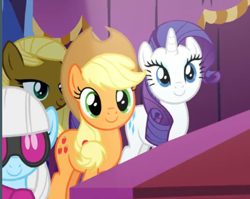Size: 676x539 | Tagged: safe, screencap, character:applejack, character:photo finish, character:rarity, species:pony, species:unicorn, episode:honest apple, g4, my little pony: friendship is magic, apple family member, clothing, cowboy hat, earthpony, fashion show, glasses, happy, hat, smiling