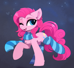 Size: 2969x2719 | Tagged: safe, artist:magnaluna, character:pinkie pie, species:earth pony, species:pony, g4, abstract background, cheek fluff, chest fluff, clothing, colored eyebrows, cute, diapinkes, ear fluff, eyebrows, female, floppy ears, high res, hoof fluff, hooves, leg fluff, looking at you, looking sideways, mare, one eye closed, open mouth, open smile, raised hoof, raised leg, scarf, simple background, smiling, smiling at you, socks, solo, striped scarf, striped socks, wink, winking at you